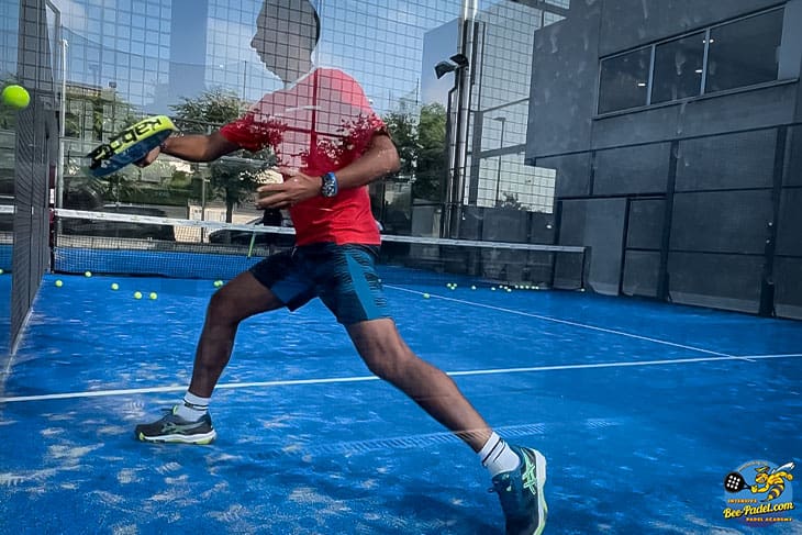Witness spectacular off-the-wall backhand skills from a Surinamese Padel player, showcasing Asics and Babolat gear during intense Padel sessions.