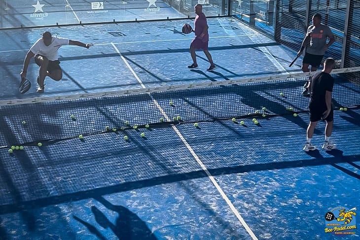 Dutch Padel players engaging in a partner change match, with an exciting move, supported by Estrella Damm and WPT for an adventurous play.