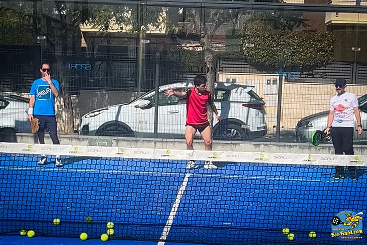 Intensive Padel Camp eventbooking.top, Padel trainer Oriol Barnet explaining how to play deep ball and why Angolan, Portuguese beginner at SorliSports, Barcelona, Spain, Padelator and Cork Padel. Best coaches in the world