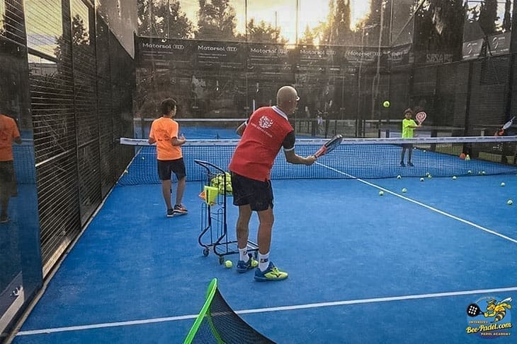 Beginner level, Novice Padel guide junior player learning how to volley
