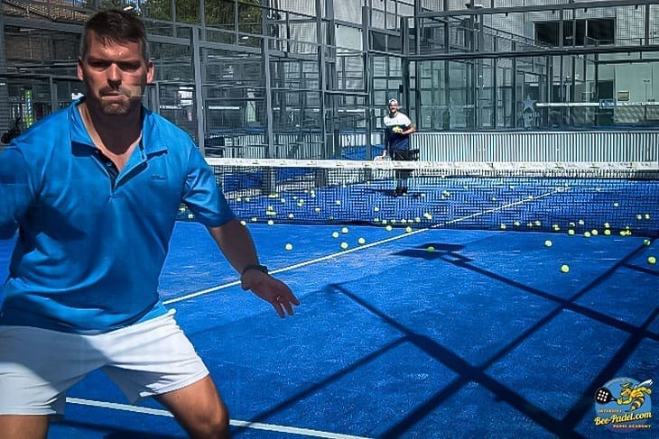 Concentrated of the wall session, which way the ball will go. Unlocking Padel Excellence: Advanced Level 2 Training Overview