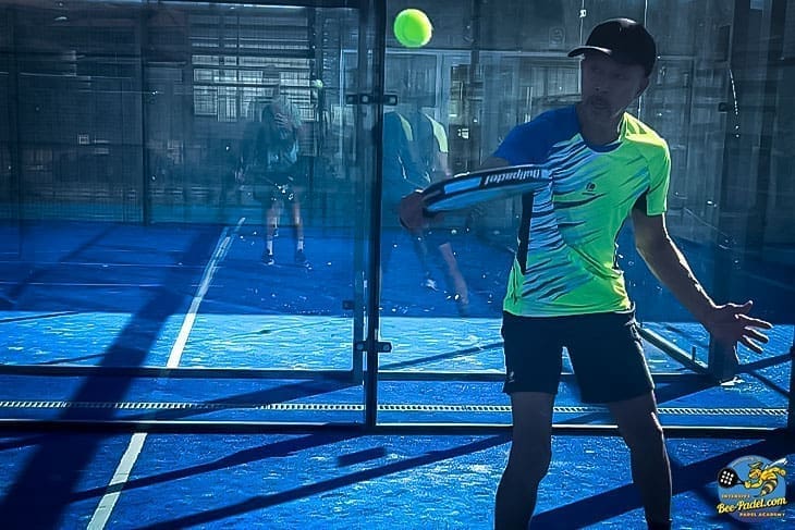 High backhand lob for expert padel player from Surinam