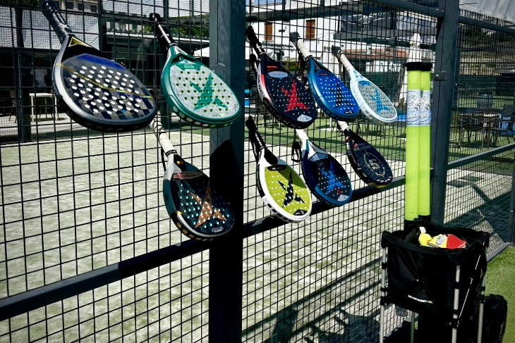 Player testing a drop shot using a handmade padel racket from Spain, known for the best quality