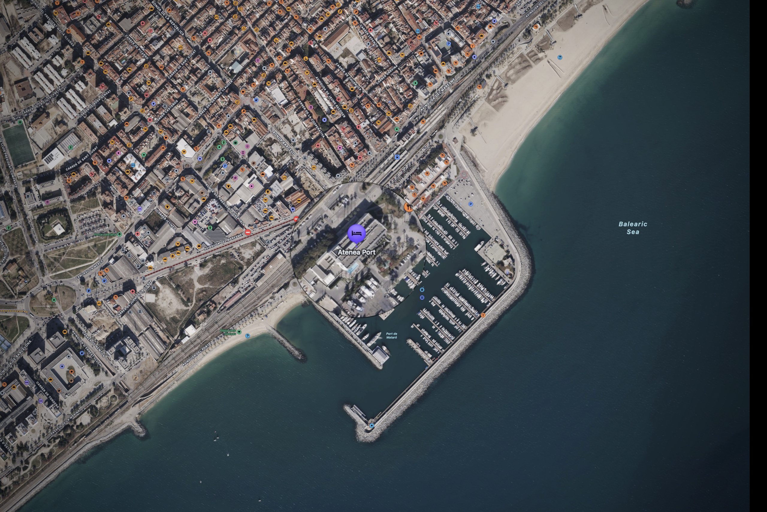 Hotel Atenea Port Mataró and Harbour Overview from Above | Google Maps View Aerial view of Hotel Atenea Port Mataró and the surrounding marina and harbour area, captured via Google Maps