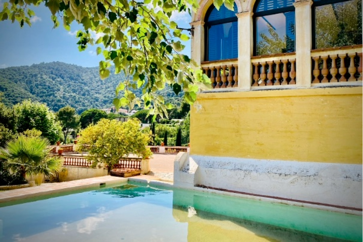 Swimming pool at Masia Can Casadellà with mountain views and real fresh mountain water, perfect for relaxation