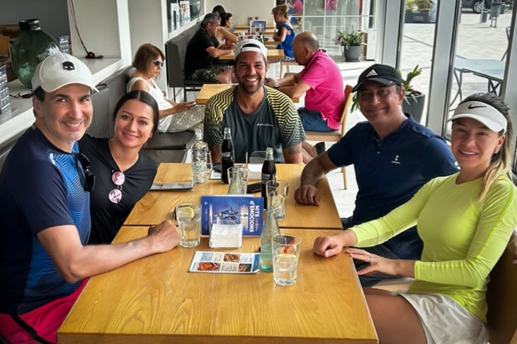 Padel Break & Fun Moments | Event Booking Training Camp – Spain adel players enjoying a fun break during Event Booking training session in Spain