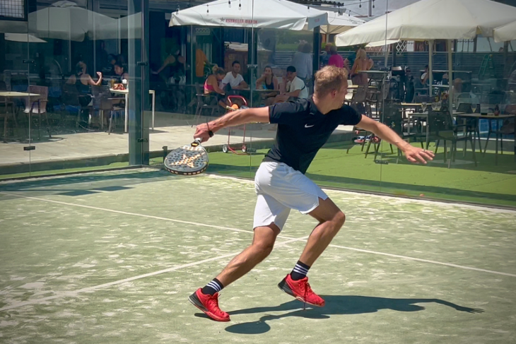 Padel player executing a wall return shot during training at Masnou Padel Ocata with Eventbooking.top, Barcelona