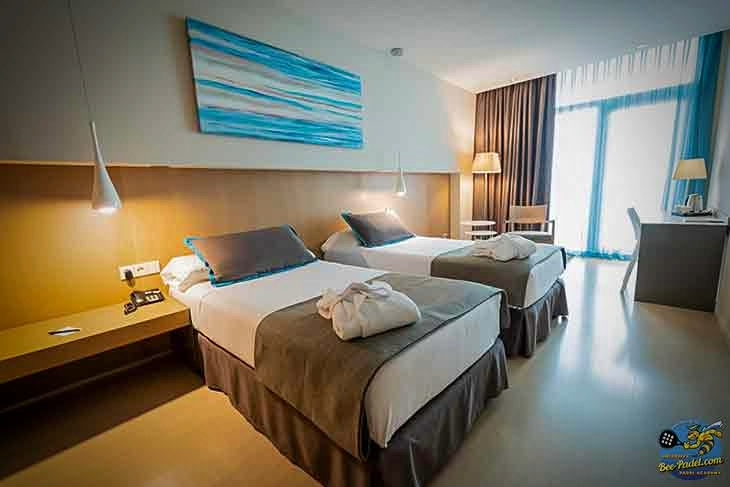 Room with Balcony View at Hotel Atenea Port Mataró | Overlooking the Harbour and Mediterranean Spacious hotel room with balcony overlooking the marina and Mediterranean Sea at Hotel Atenea Port Mataró
