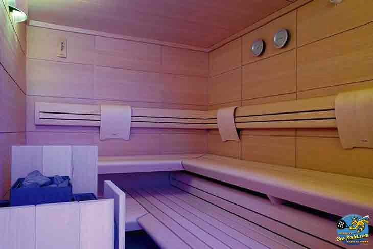 Interior view of the sauna at URH Hotel Mataró, a relaxing wellness feature for padel event guests.