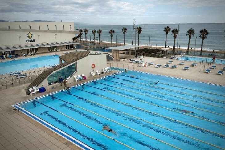 Eventbooking.top Olympic swimming pool at CNAB beachfront club in Barcelona